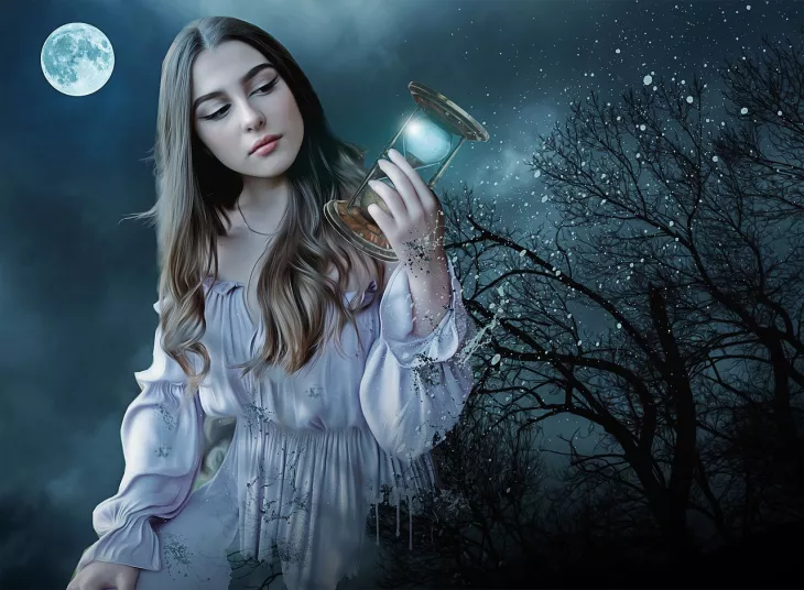 woman in moonlight with hourglass