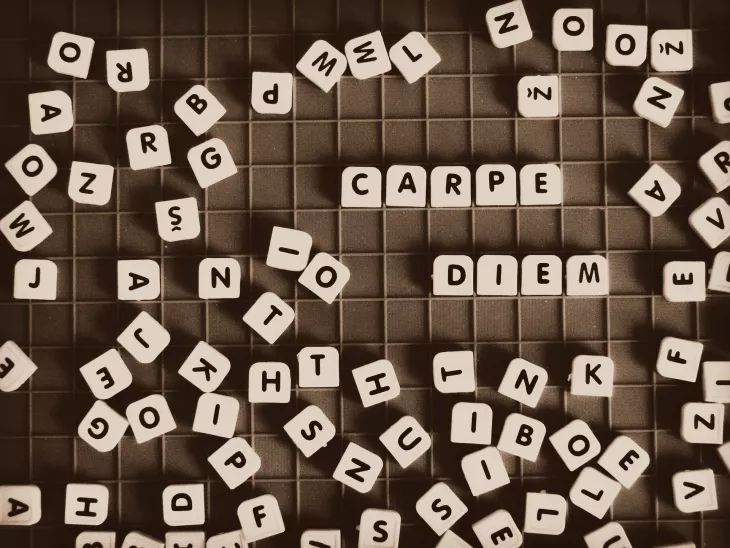 Scrabble tiles making Latin words