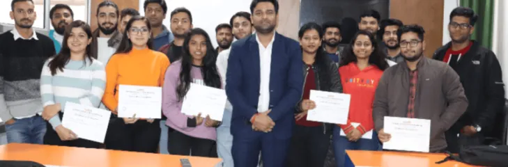 Students holding certificates after completing a digital marketing training session at DSOM in Dehradun