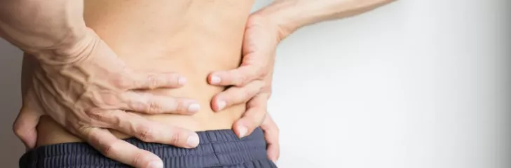 man-holding-his-back