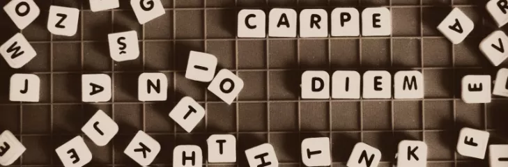 Scrabble tiles making Latin words