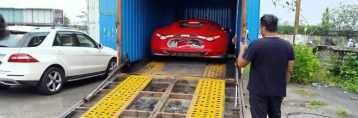 Car loading to the truck for transport  to destination
