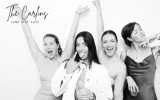 Guests enjoying a modern photo booth at a Portland celebration.