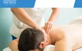 Ayurvedic therapist massaging the neck of a male patient