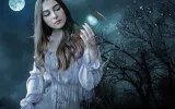 woman in moonlight with hourglass